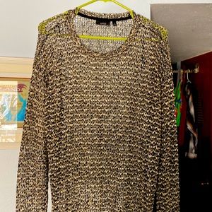 Apt 9 size med. Very loose stitched knit.